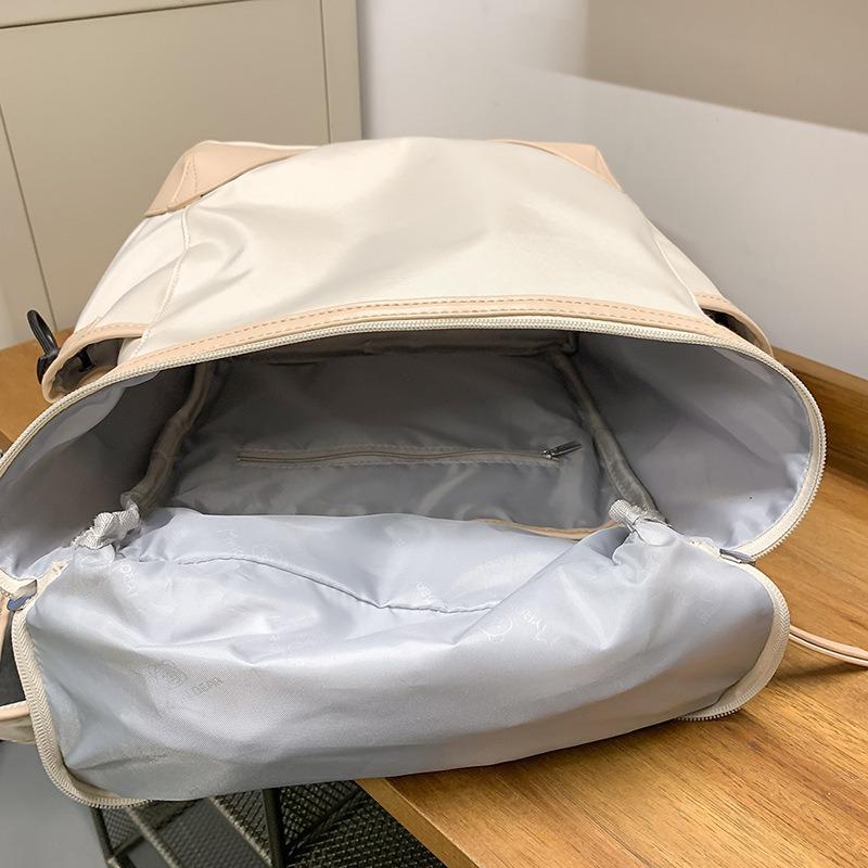 Neuer lässiger vielseitiger Rucksack mit großer Kapazität, leichter und modischer Pendler-Reiserucksack, Nischen-Einfarb-Schulranzen