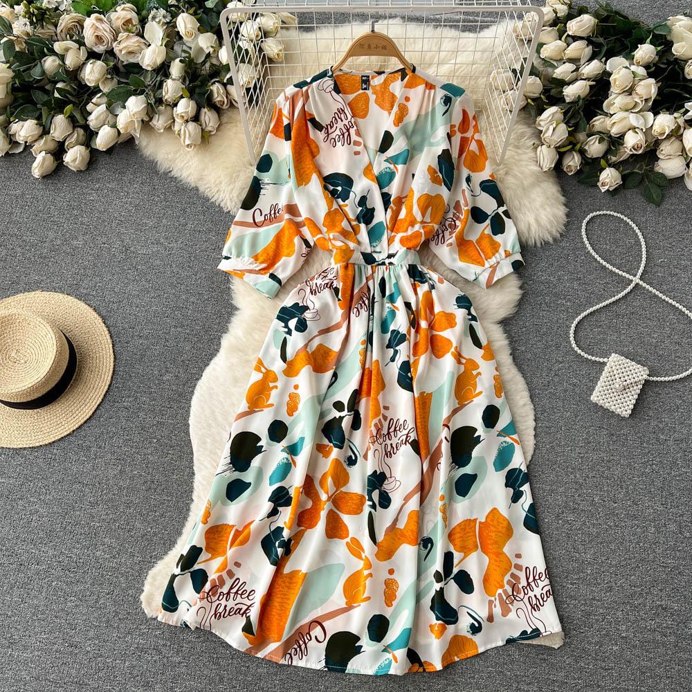 Abito estivo da donna stampato vintage elegante scollo a V manica a sbuffo vita alta abito midi a trapezio abiti da spiaggia per le vacanze femminili