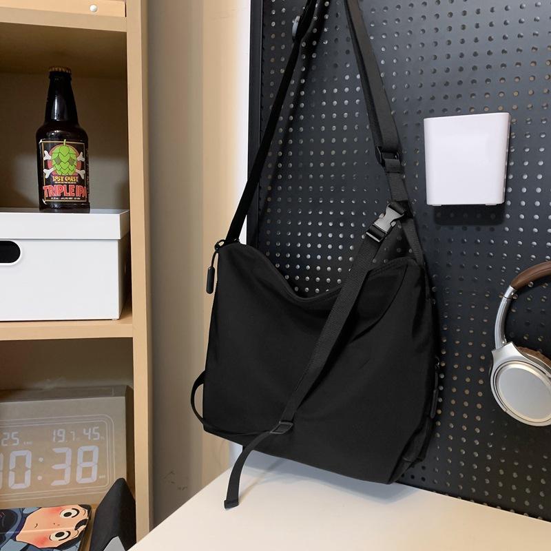 

Crossbody Bag Couple Trendy Brand Tooling Satchel Cycling Backpack Women S Casual Shoulder Bag Canvas Student Messenger Bag чорний