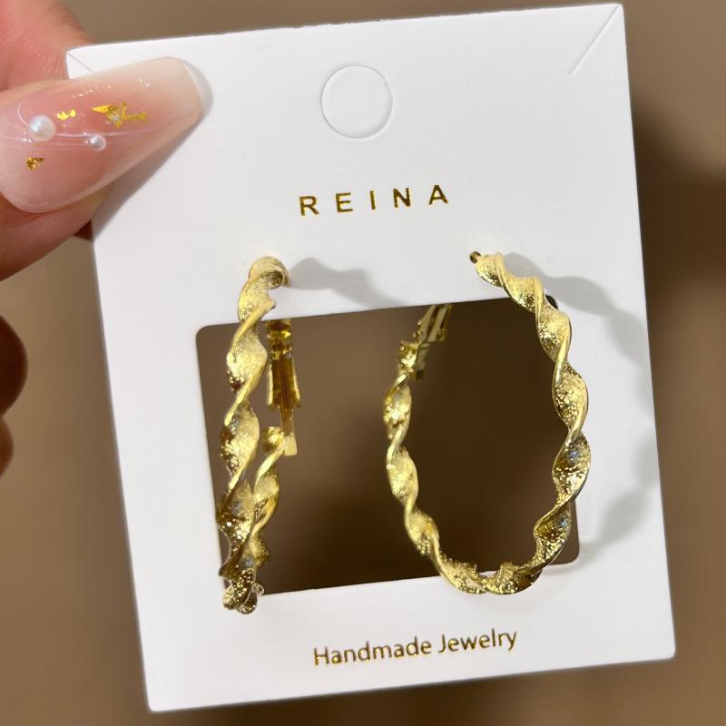 

New Exaggerated Twisted Women s Hoop Earrings Gold Color Uneven Metal Loop Earrings Punk Personality Fashion Ear Zircon