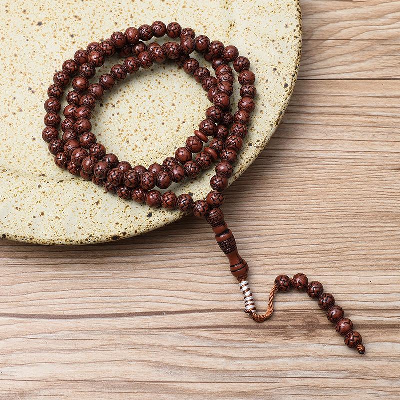 Ručně vyráběný 99-korálkový růženec Tasbih s imitací dřevěné kresby ze Saúdské Arábie