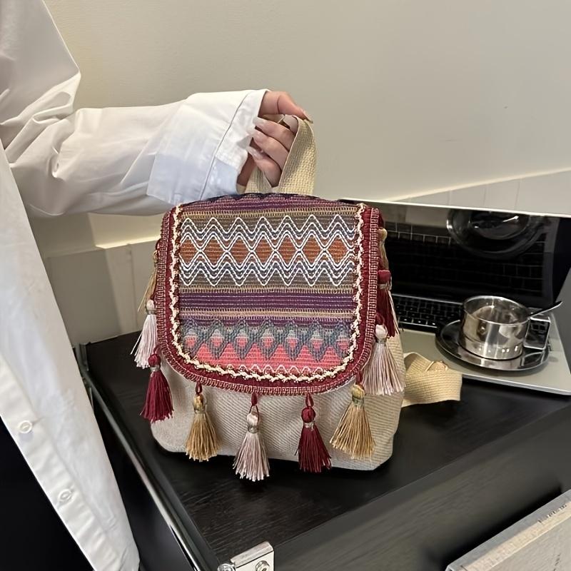 Schicker leichter Canvas-Rucksack mit Quasten-Detail Modischer Kordelzugverschluss Polyestergefüttert Damen Reise-Tagesrucksack
