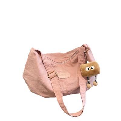 KKYOYRE Large Capacity Shoulder Bag, Soft Material, Cute and Relaxed Design, Crossbody Tote Bag with Biscuit Charm, Adjustable Strap, Zipper Closure,