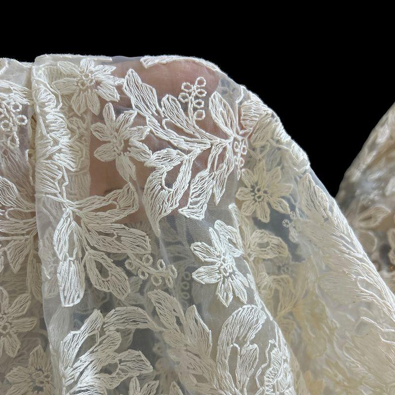Light and delicate flower embroidery lace jacquard fabric suitable for wedding dresses formal gown and designer clothing fabrics
