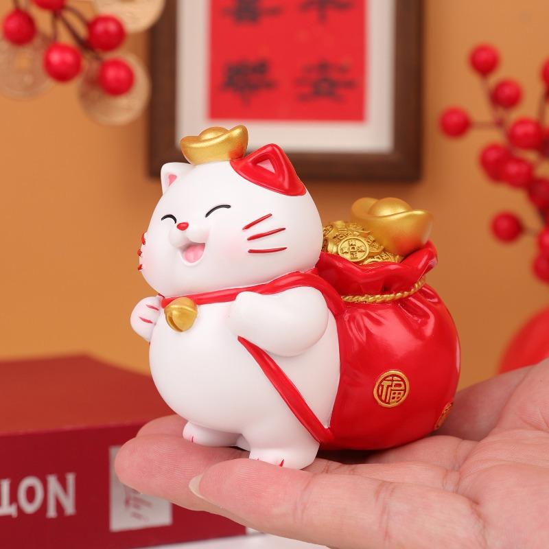 There Are Various Types of Home Decorations Such As The Lucky Cat Ornaments, Festive Tablecloths, and Resin Handicrafts for The Entrance Hall