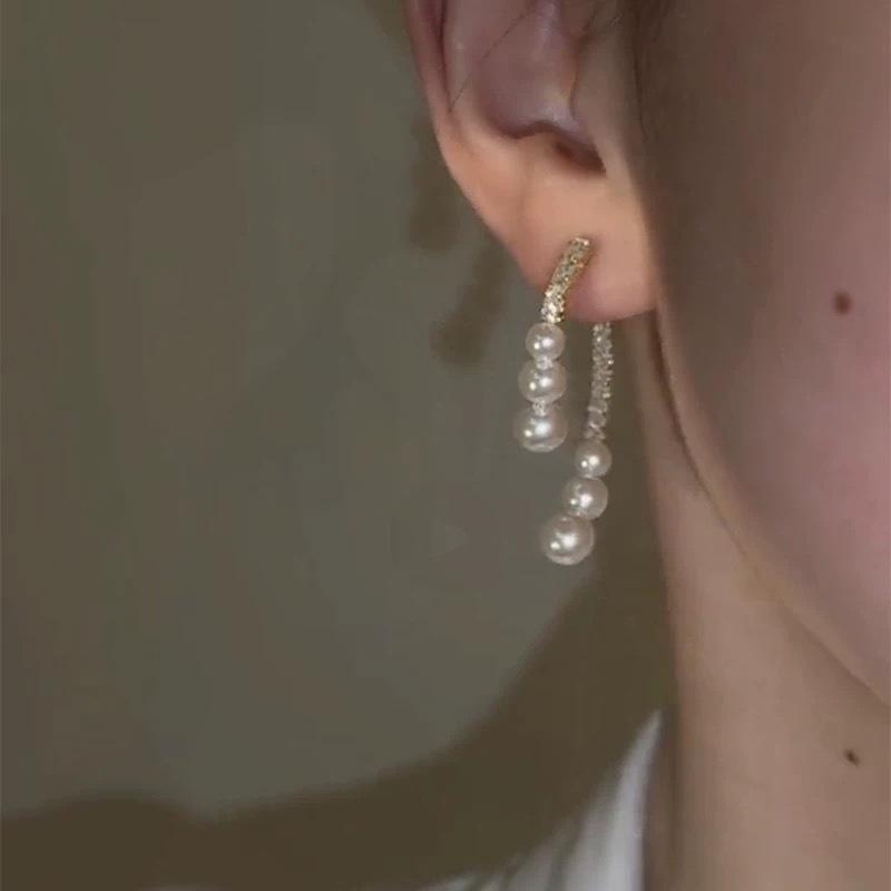 111 silver needle niche design cross pearl stud earrings for women exquisite, light luxury high-end earrings, temperament and versatile earrings