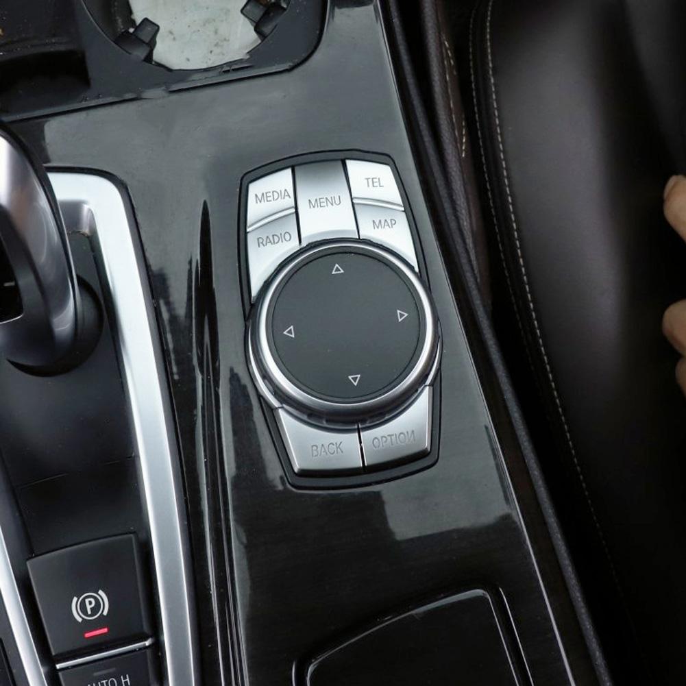 Auto rooliratta kliimaseadme nupp Keskjuhtimisnupp Süüte Mootori käivituskatted Dekoratsioonikatte katte kleebis BMW 5-seeria jaoks