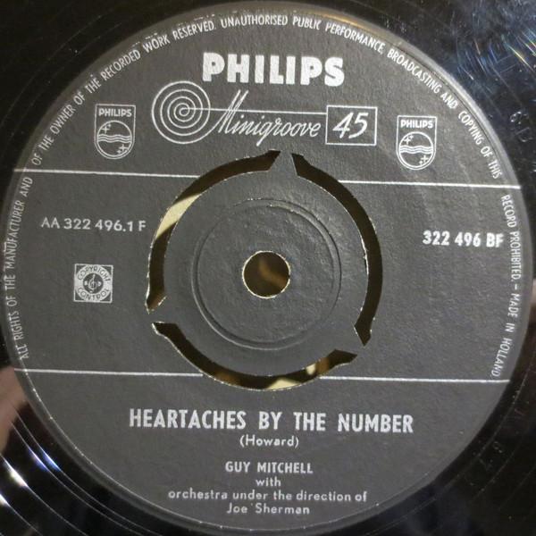 

7-дюймовая пластинка ГАЙ МИТЧЕЛЛ Heartaches By The Number 322496BF Philips 1959 Нидерланды КантриФолк Б/у