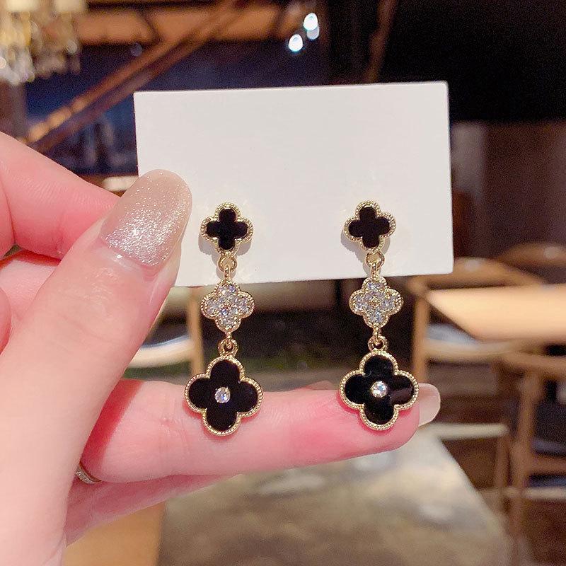 2024 Four-Leaf Clover Silver Needle Earrings: Korean High-End Style, Elegant & Trendy.