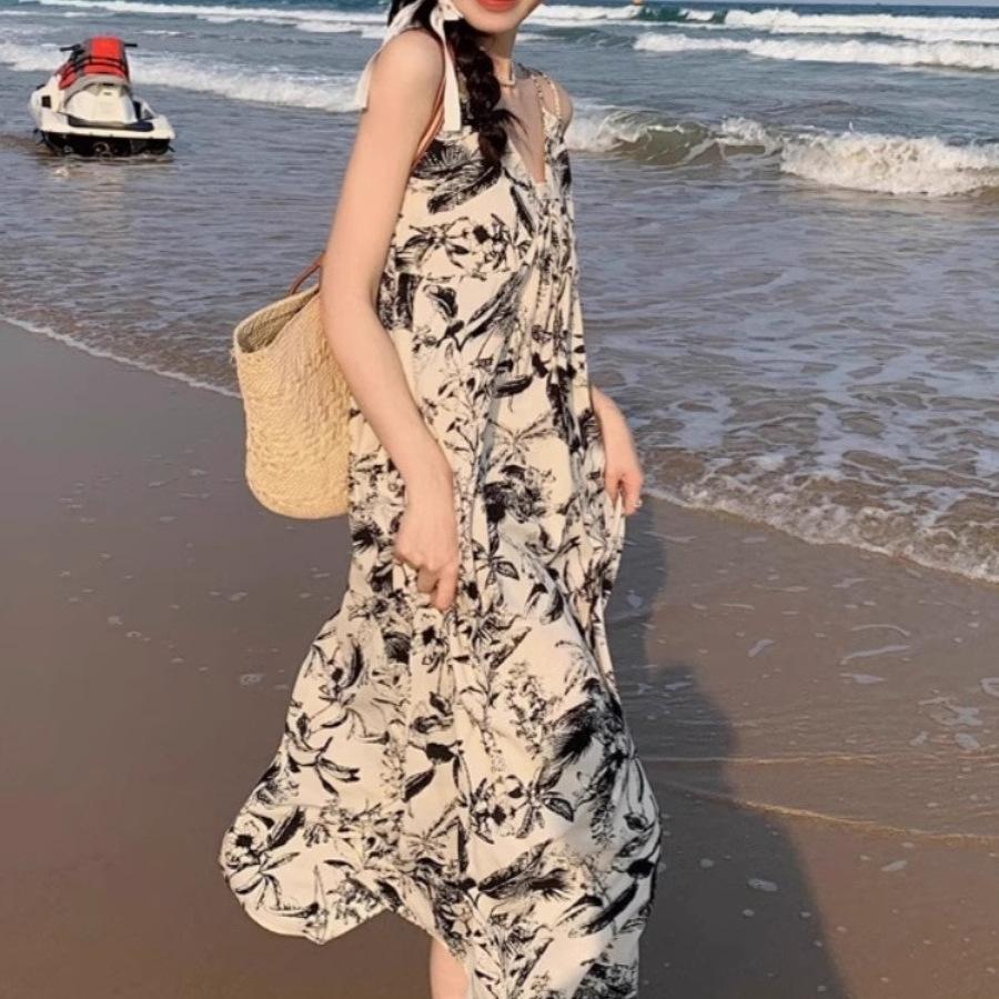 Holiday wind floral v-neck halter suspender dress for women's summer niche loose waist over knee A-shaped long dress wholesale