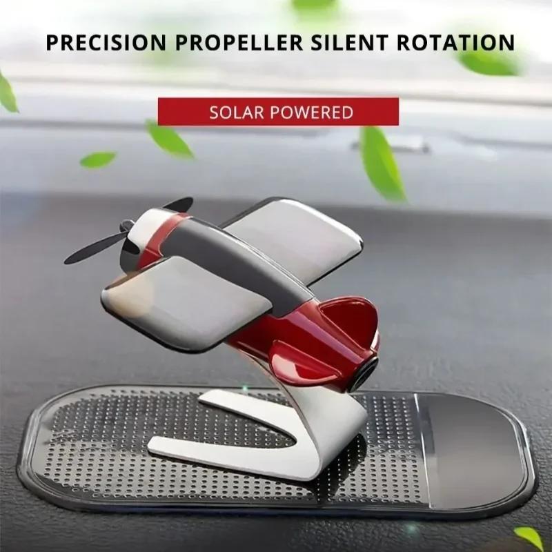 Solarbetriebenes drehendes Flugzeug Auto-Innenraum Armaturenbrett Flugzeugmodell Drehende Mini-Flugzeug-Ornamente für Auto Büro Wohnkultur