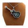 Stones and Minerals. Raw Aquamarine Necklace. Guitar Model.