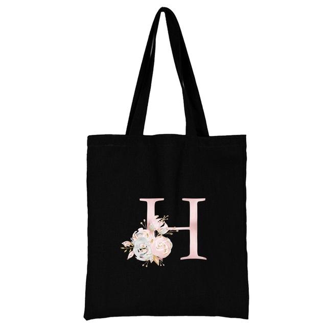 

Сумка для покупок, черная женская пригородная сумка с розовым цветком и буквами, имя, начальный узор, серия с принтом, холщовая сумка на плечо, многоразовая сумка-тоут 24*26cm