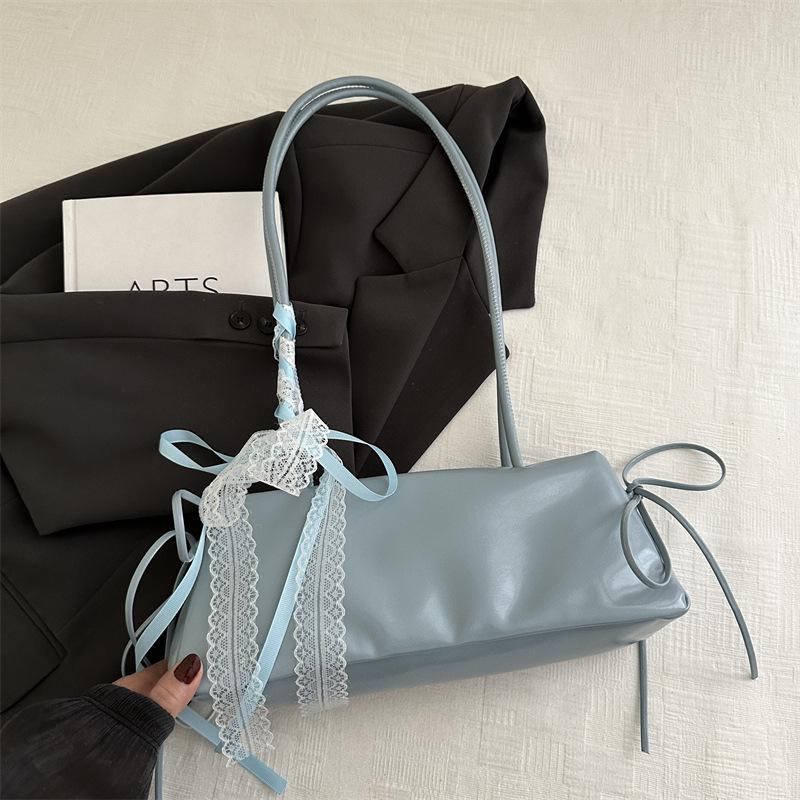 Korean version of simple ins baguette bag women's 2025 new trendy versatile commuter shoulder bag casual bow armpit bag