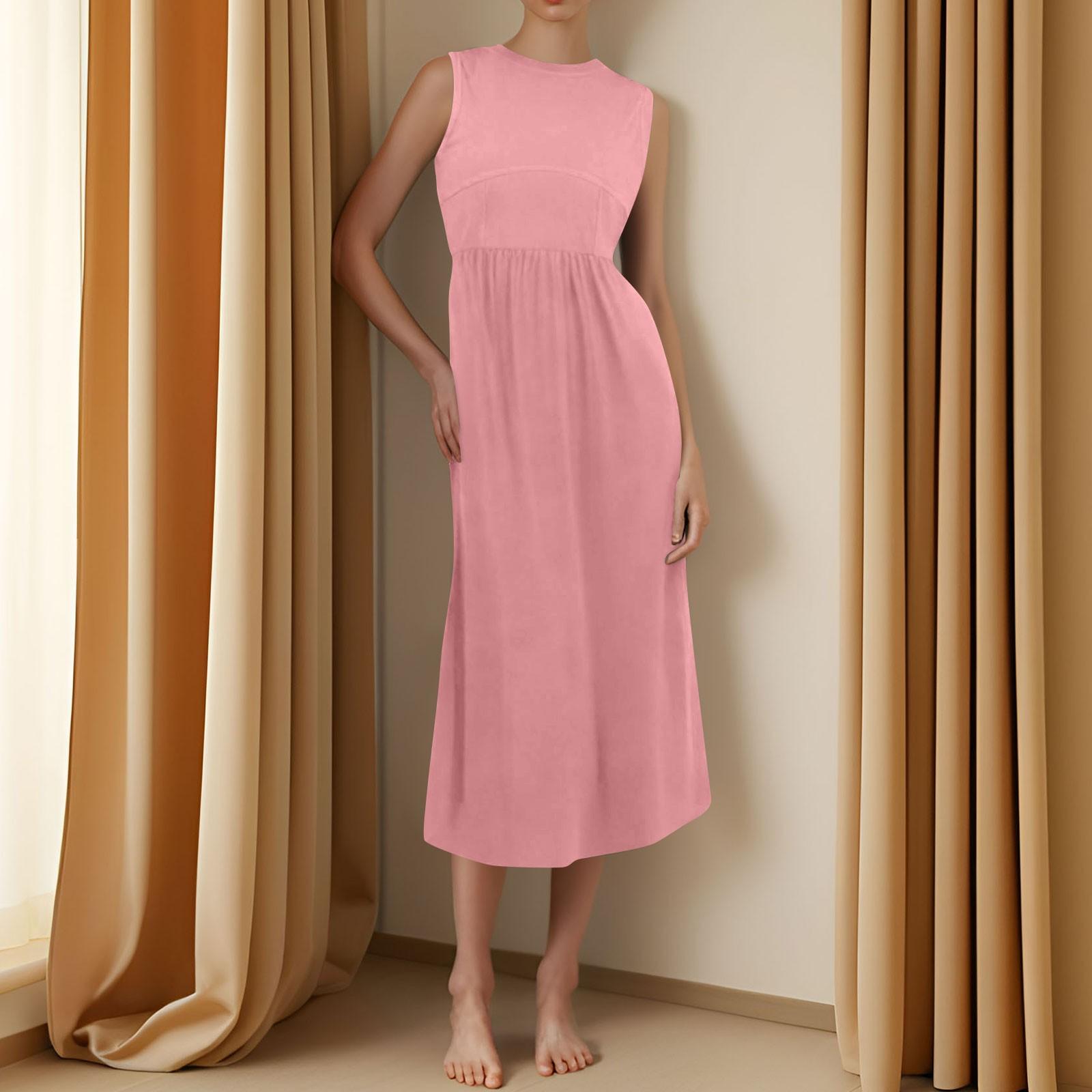 

Жіноча повсякденна модна сукня міді без рукавів з однотонним нерівним подолом і круглим вирізом рожевий