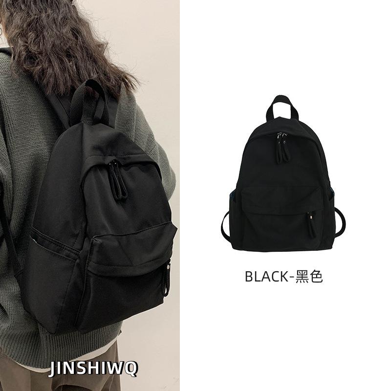 

Школьный рюкзак женский для студентки колледжа 2025 новый простой и легкий дорожный рюкзак большой вместимости рюкзак для девочек-подростков рюкзак мужской чёрный