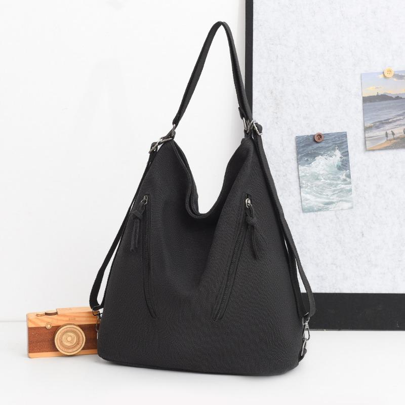 

Large capacity canvas backpack, messenger bag, schoolbag, solid color handbag, casual multi-purpose travel backpack, shoulder bag. чёрный