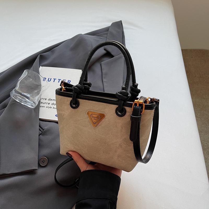 New product hot sale fashionable retro high texture women's hand bucket bag versatile commuter casual messenger bag