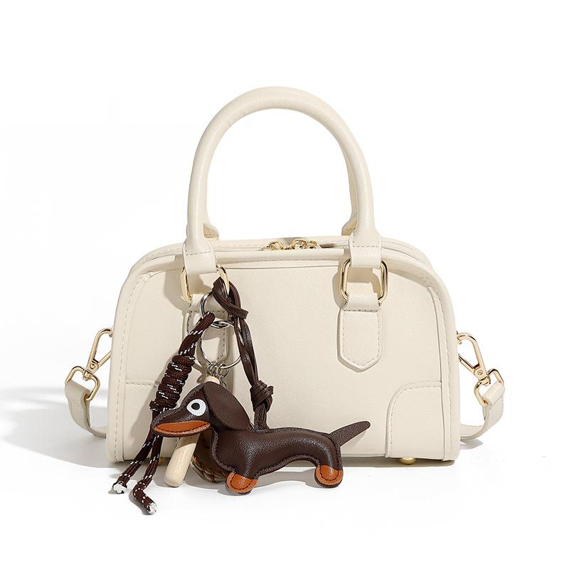 

Кожаная сумка женская новая для поездок на работу универсальная сумка-боулинг сумка-мессенджер на одно плечо нишевая сумка через плечо 21.5*9*13