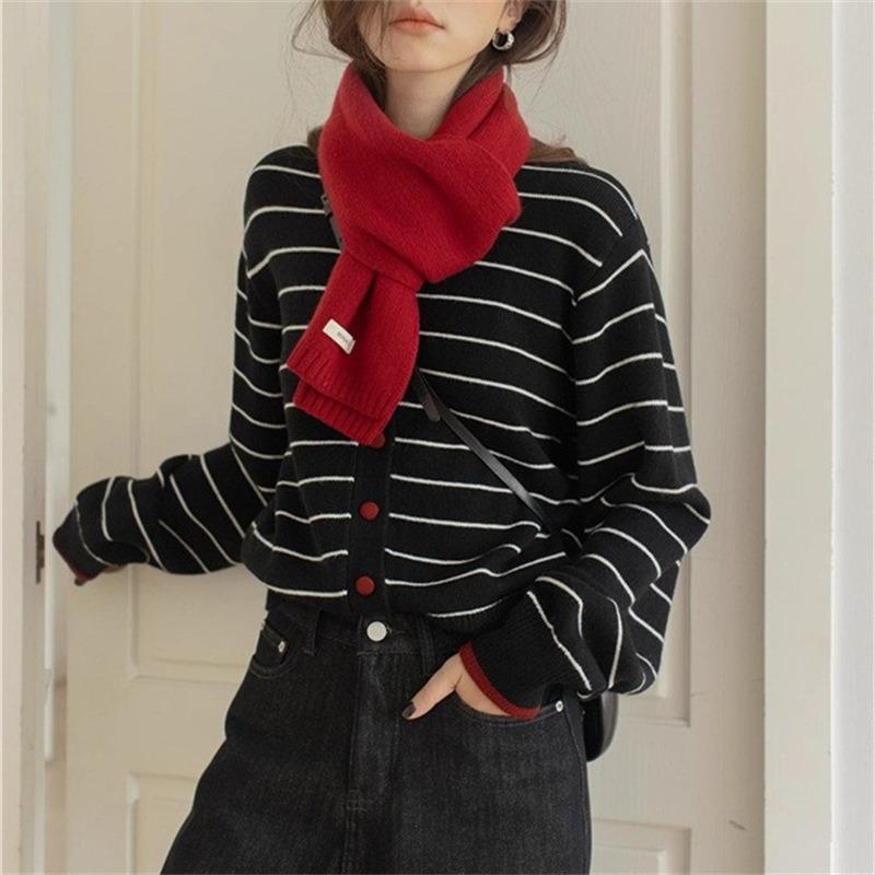 Autumn and winter new contrasting color striped knitted cardigan women's design sense versatile temperament niche sweater jacket top
