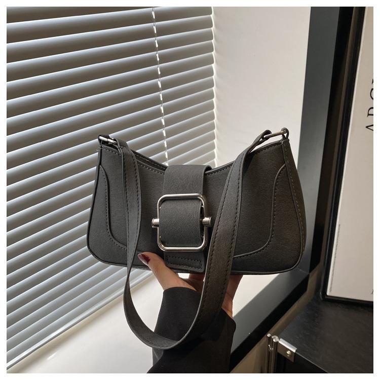 Korean version of temperament simple fashion shoulder bag women s 2025 spring new niche ins baguette bag Korean version of women s bag