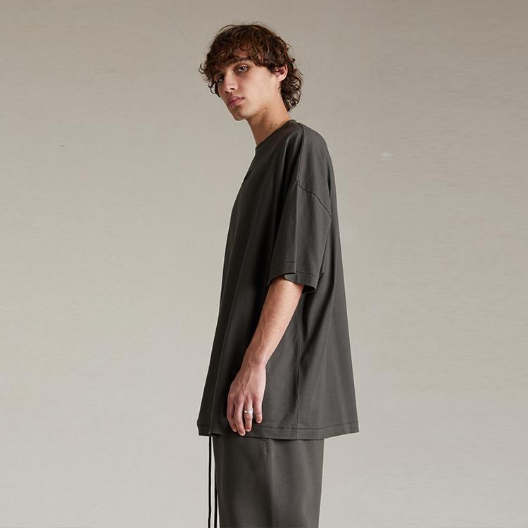 Fear of God Essentials Kortarmet T-skjorte Ink Herre Topper Svart 125SP244190F