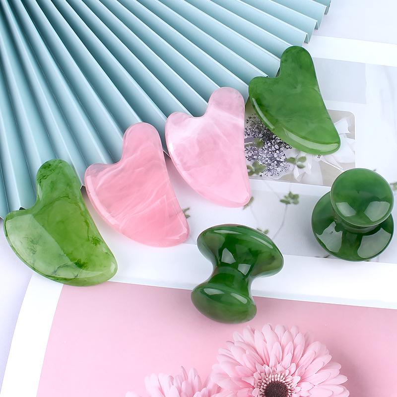Rose Quartz Heart-Shaped Facial Massage Tool with Red Triangle Meridian Stick