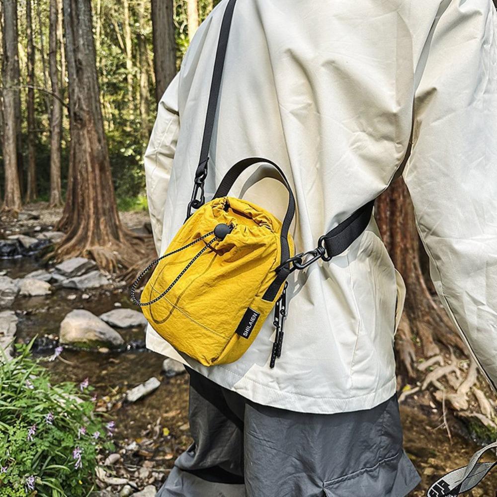 bags are popular for men's and women's outdoor leisure, ultra-light and water-proof, portable small bags, and versatile mobile phone bags.