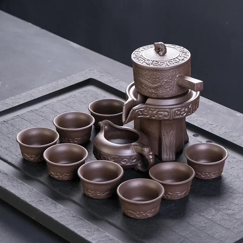 

Purple Clay Stone Grinding Semi-automatic Tea Set Creative Kung Fu Tea Hot Sales of Tea Set.Creative Tea Ceremony Supplies Cup
