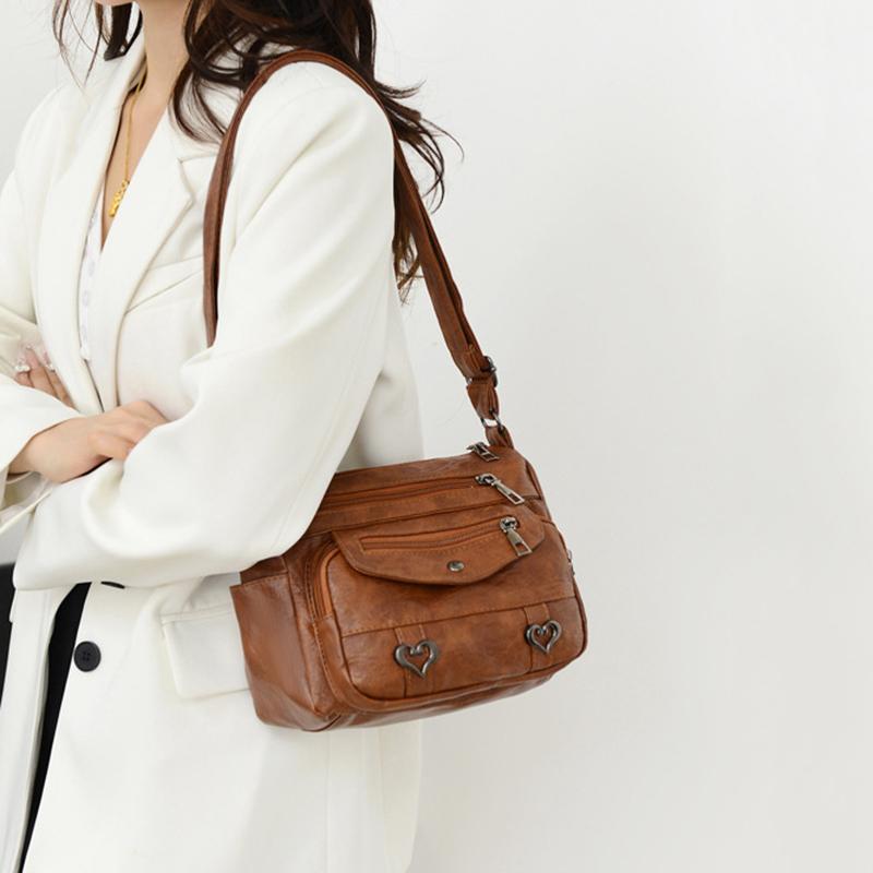 Mehrschichtige Umhängetasche mit Herzdekor, modische Damen-Leder-Crossbody-Taschen, geeignet für den Arbeitsweg