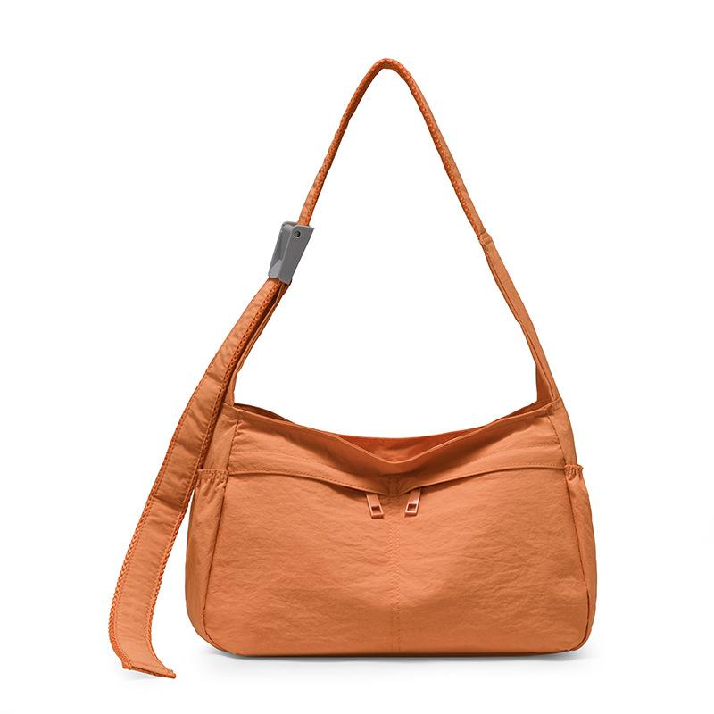 

Korean version 2025 summer new large-capacity commuter bag casual shoulder tote bag waterproof sports wind messenger bag bag помаранчевий