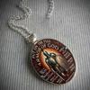 A vintage Christian Ephesians 6:10 pendant necklace featuring God fully armed, made of time-worn gemstone glass, suitable for both men and women.