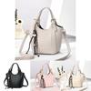 Delightful Cream Colored Handheld Bag For Women With Sturdy Shoulder Strap Perfect For Spring Adventures