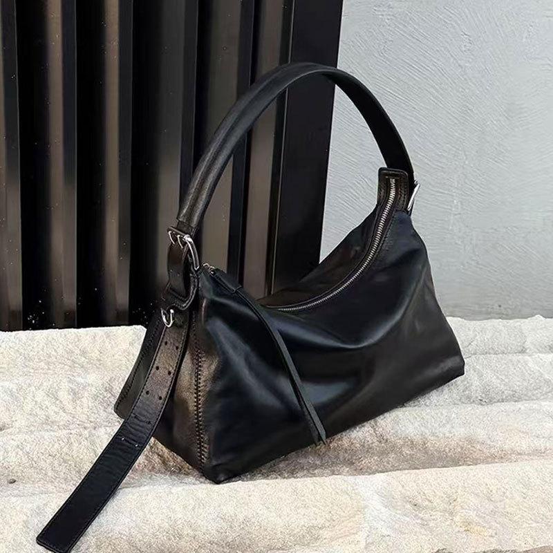 Minimalist vegetable tanned cowhide hobo armpit bag leather baguette bag commuter shoulder messenger bag women s urban simple light luxury