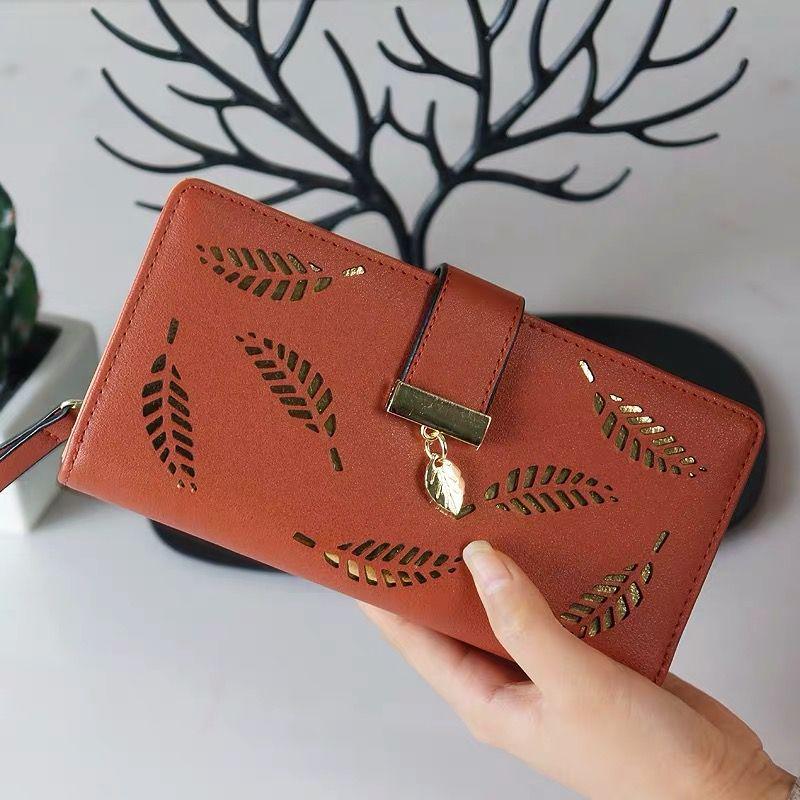 Youthful Embossed Long Wallet: Three-in-One Coin Purse, Anti-Magnetic, Multi-Card Slot Holder, with Elegant Cutout Design.