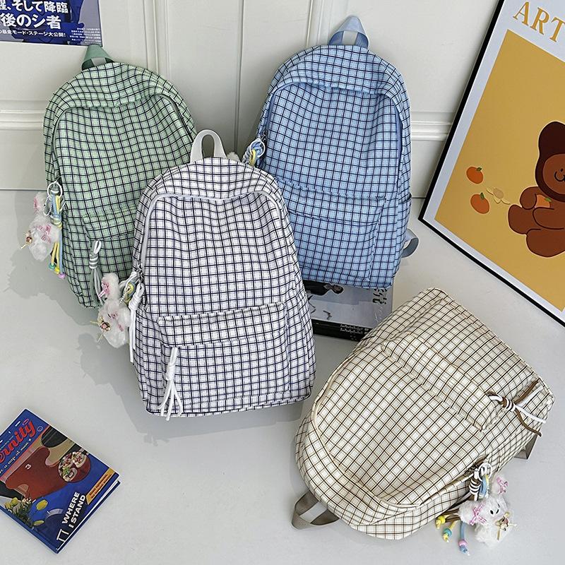 Schultasche Retro Hongkong-Stil karierter Rucksack weiblich neu große Kapazität Mittelstufenschüler College-Studenten Klasse Schultasche Reise-Computer-Rucksack
