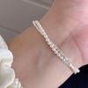 Süßes doppellagiges Silberperlenarmband im koreanischen Stil für Damen - Modisch, vielseitig und stilvoll.