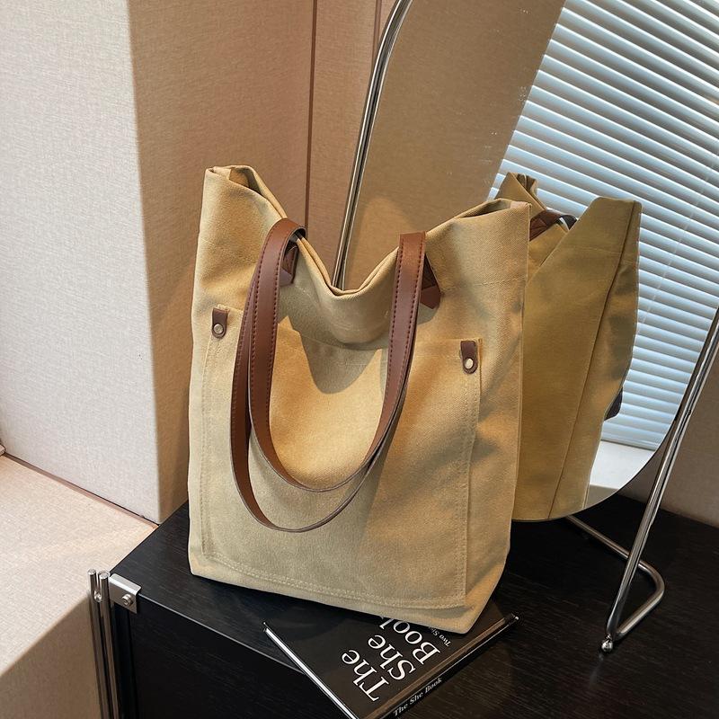 Niche retro canvas bag women's new large-capacity casual shoulder bag class commuter tote bag