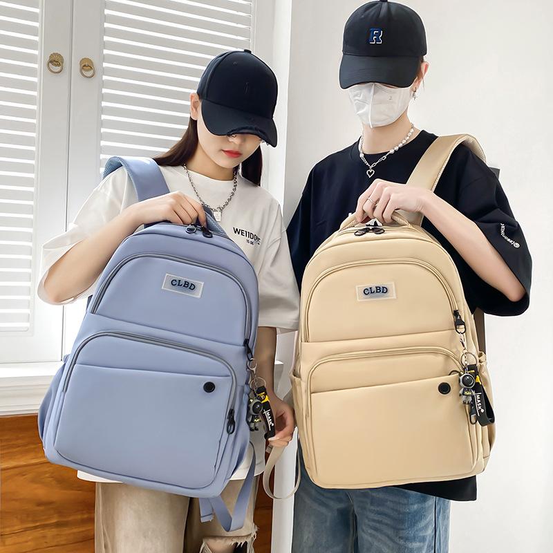 College student backpack Korean version of casual Oxford cloth junior high school student schoolbag large capacity outdoor travel backpack