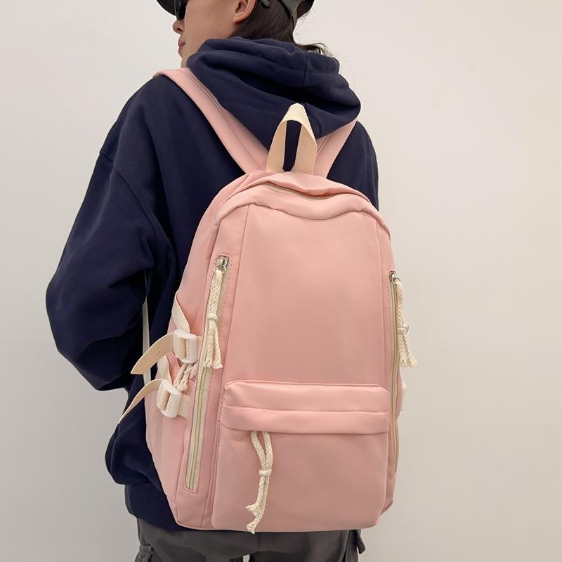 Schoolbag female Korean version student Harajuku female backpack, high school student junior high school ins wind large capacity solid color backpack