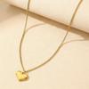 Gold Stainless Steel Cross Necklace - Light Luxury High-End Collarbone Chain with Gold Heart.