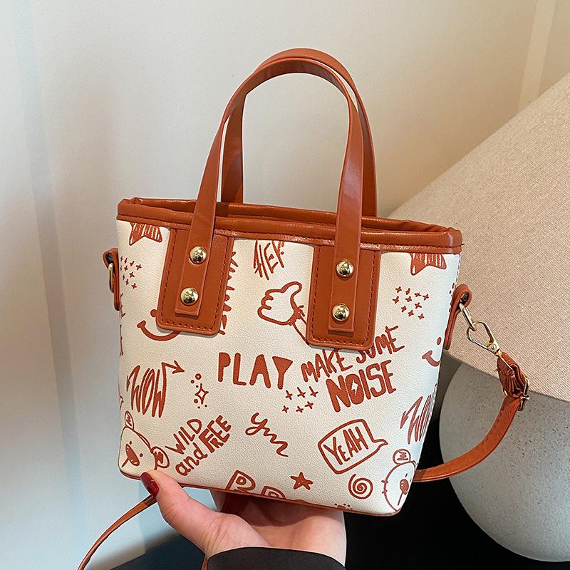 Fashionable and Trendy Printed Shoulder Bag for Women's New Simple Hand To Wear Tote Bag for College Students' Commuting Class Bag