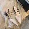 Sandals women's new spring and summer new European and American pointed head bag head word with medium heel thick heel shoes