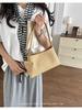 Elegant French Woven Pattern Baguette Women's Shoulder Bag 2026