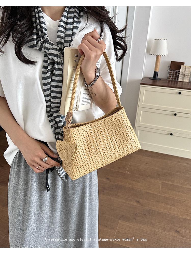 Elegant French Woven Pattern Baguette Women's Shoulder Bag 2026
