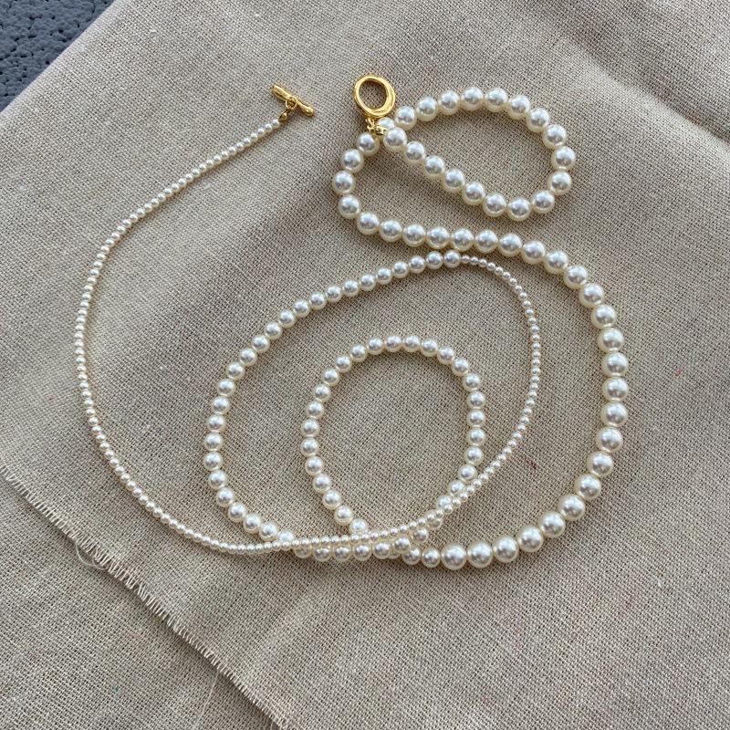 Gradient Pearl Necklace for Women - French Luxury Niche Design, Versatile Long OT Buckle Sweater Chain.