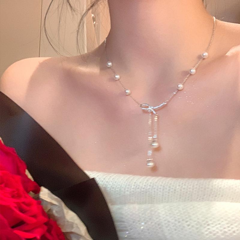 Romantic love letter!! Bow pearl fringed necklace women s light luxury niche neck chain design sense premium collarbone chain