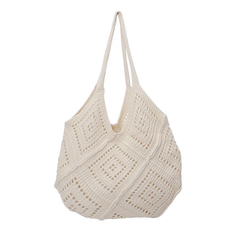 Korean version of fashion hollow knitted bag women's large-capacity seaside vacation shoulder bag versatile woven tote bag
