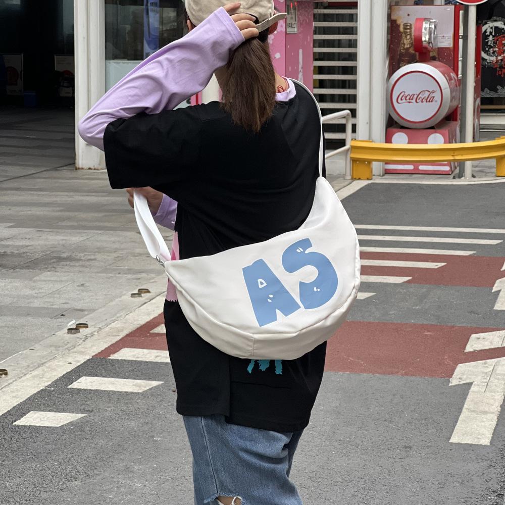 

Spring large-capacity nylon dumpling bag women s messenger bag men s urban sports cycling bag shoulder bag