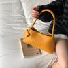 New Casual Woven Bag Women'S French Niche Temperament Hand Bag New Shoulder Underarm Simple Baguette Bag